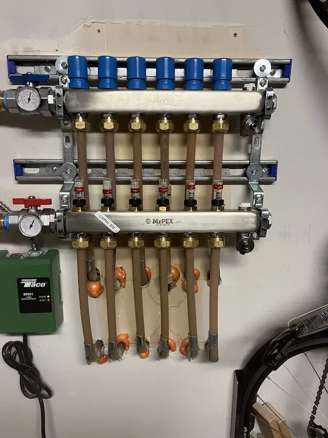 Plumber performing Gas Line Installation at a residential property in Stone Mountain